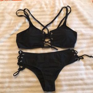 Black lace up bikini set. L but fits like a M